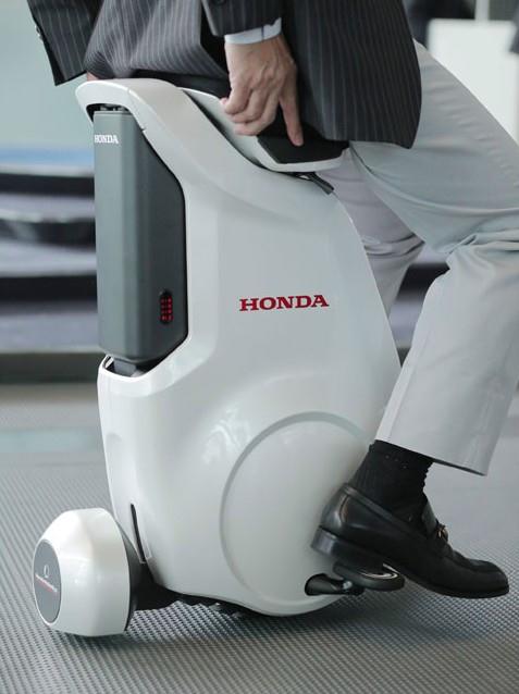 моноцикл Honda UNI-CUB мотор колесом